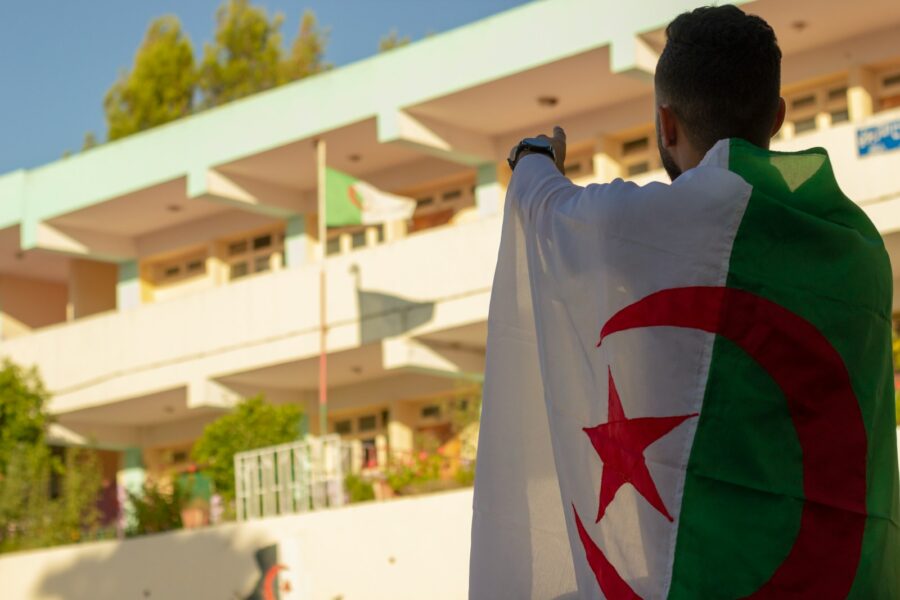 Algerian independence celebration crowd flags
