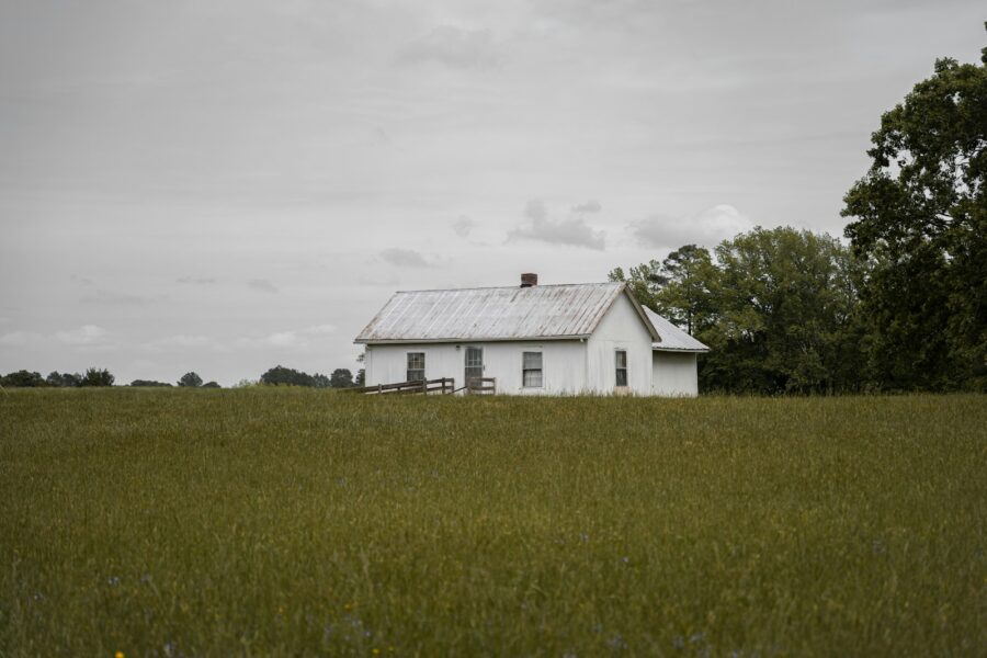 Abandoned southern plantation house cotton field