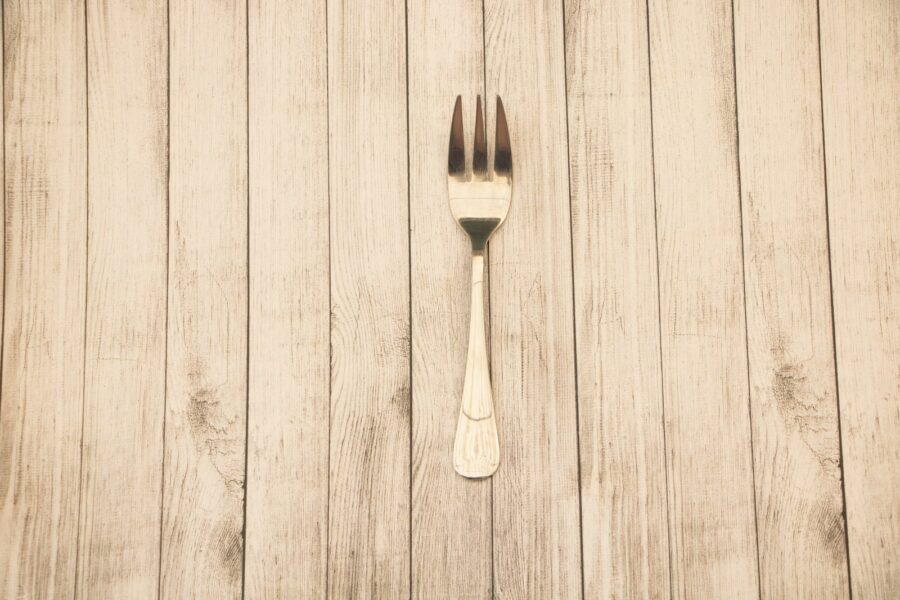 Antique silver fork wooden table