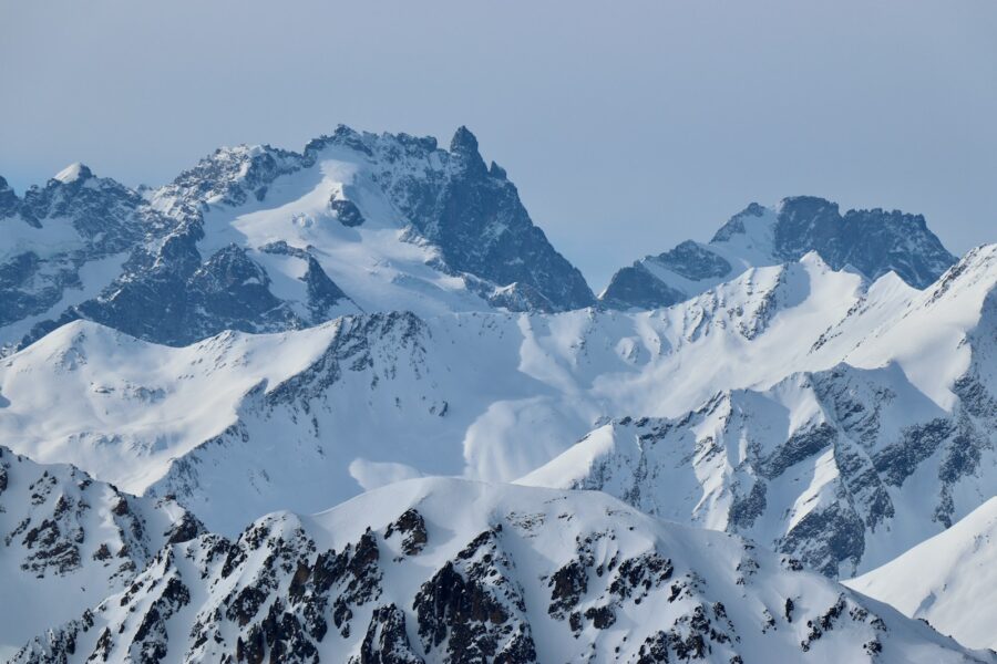 Alpine glacier snow rocky peaks