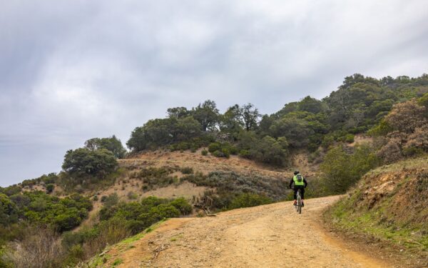 The forgotten cyclist who rode across Asia and left his story in the sand